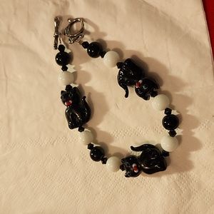 Bracelet needs glasses cat